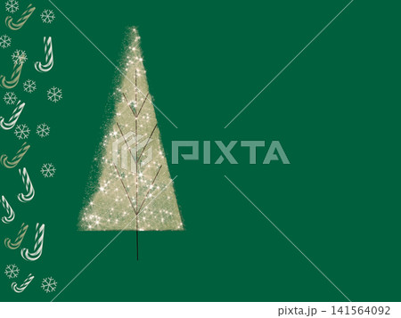 Sparkling Christmas tree on Candy cane Christmas decoration border green background Sparkling Christmas tree on Candy cane Christmas decoration border green background 141564092