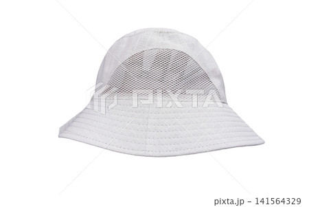 A white fabric bucket hat on a white background. A white fabric bucket hat on a white background. 141564329