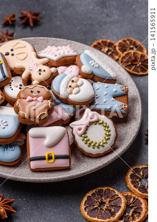 Gingerbread as a Christmas staple, sweet biscuits for the holiday. Gingerbread as a background 141565911