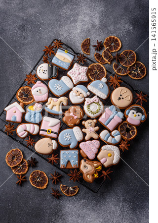 Gingerbread as a Christmas staple, sweet biscuits for the holiday. Gingerbread as a background 141565915