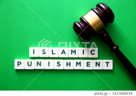 Islamic punishment tiles with gavel representing sharia law Islamic punishment tiles with gavel representing sharia law 141566034