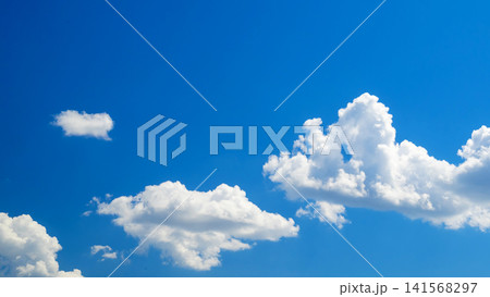 cumulus white clouds on the right side against rich blue sky cumulus white clouds on the right side against rich blue sky 141568297