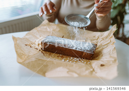 chocolate cake with powdered sugar chocolate cake with powdered sugar 141569346