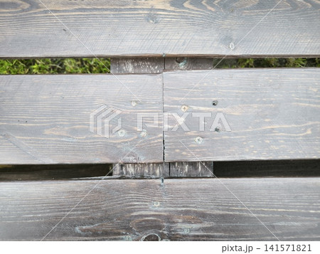 Dark grey planks with wood grain Dark grey planks with wood grain 141571821
