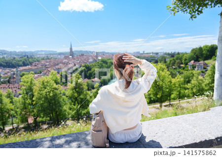 Woman Tourist Exploring Bern, Switzerland. Traveler Visit Rosengarten, Bern Old Town Viewpoint, Famous European Landmark, Popular Tourist Attraction and Travel Destination in Europe Woman Tourist Exploring Bern, Switzerland. Traveler Visit Rosengarten, Bern Old Town Viewpoint, Famous European Landmark, Popular Tourist Attraction and Travel Destination in Europe 141575862