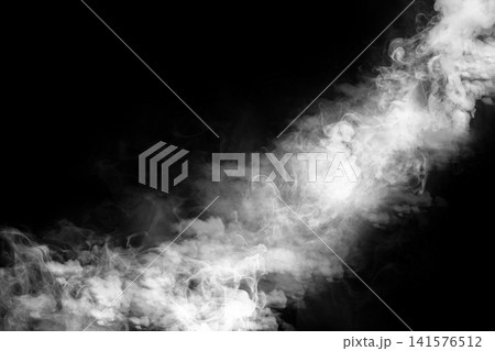 A dynamic diagonal plume of white smoke, vapor, or fog isolated against a deep black background, perfect for compositing effects, creative graphic design, and artistic texture. Smoke background A dynamic diagonal plume of white smoke, vapor, or fog isolated against a deep black background, perfect for compositing effects, creative graphic design, and artistic texture. Smoke background 141576512