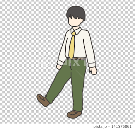 A boy walking in a blazer uniform with green trousers. A boy walking in a blazer uniform with green trousers. 141576861
