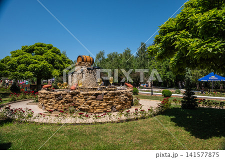Beautiful stone wine fountain at Milestii Mici winery entrance Beautiful stone wine fountain at Milestii Mici winery entrance 141577875