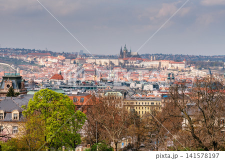 Panoramic View of Prague Castle Above Historic City Rooftops in Spring Light Panoramic View of Prague Castle Above Historic City Rooftops in Spring Light 141578197
