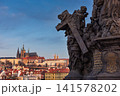 Prague Castle and Charles Bridge Sculpture Overlooking Historic Prague City Skyline 141578202