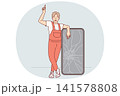 Man repairman stands near phone with broken display and points up, recommending protective film 141578808