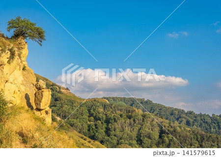 The Human Rock in Kislovodsk. Tourist attraction, Rock Man on the mountain Small saddle. Kislovodsk, North Caucasus, Russia 141579615