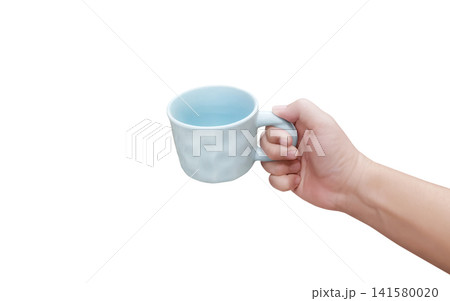 A white ceramic coffee mug is empty in a man's hand. 141580020