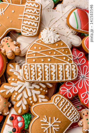 Gingerbread as a Christmas staple, sweet biscuits for the holiday table. Gingerbread as a backdrop Gingerbread as a Christmas staple, sweet biscuits for the holiday table. Gingerbread as a backdrop 141583546