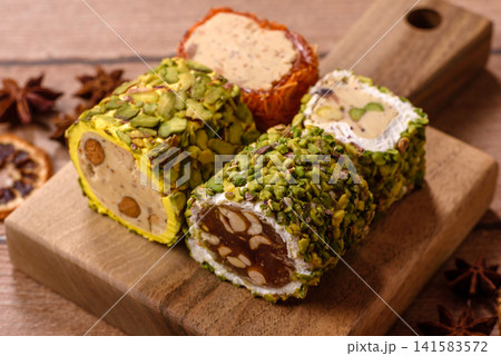 Turkish delight or lokum is a traditional Eastern sweet made with nuts. Turkish delight, lokum Turkish delight or lokum is a traditional Eastern sweet made with nuts. Turkish delight, lokum 141583572