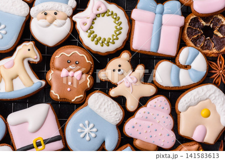 Gingerbread as a Christmas staple, sweet biscuits for the holiday. Gingerbread as a background 141583613