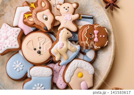 Gingerbread as a Christmas staple, sweet biscuits for the holiday. Gingerbread as a background 141583617
