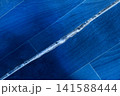 Broken torn linoleum old rubber polymer PVC floor damage material flooring repair blue object line stripe 141588444