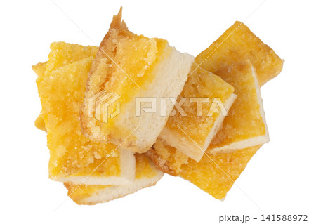 Bread with butter and sugar sprinkled on top piece pile Bread with butter and sugar sprinkled on top piece pile 141588972