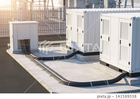 Modern electrical equipment with power cables and ventilation units on concrete pad Modern electrical equipment with power cables and ventilation units on concrete pad 141589338