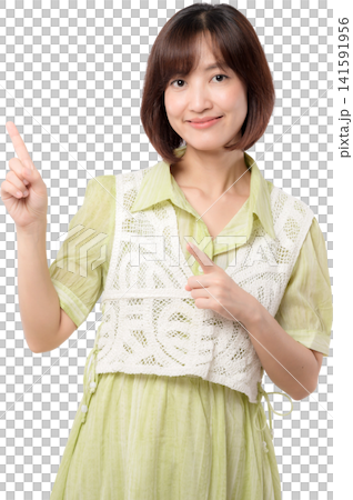 Young asian woman smiles, happy and cheerful, pointing. She offers great information, presenting service Young asian woman smiles, happy and cheerful, pointing. She offers great information, presenting service 141591956