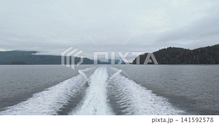 White foamy wake left by boat closeup 141592578