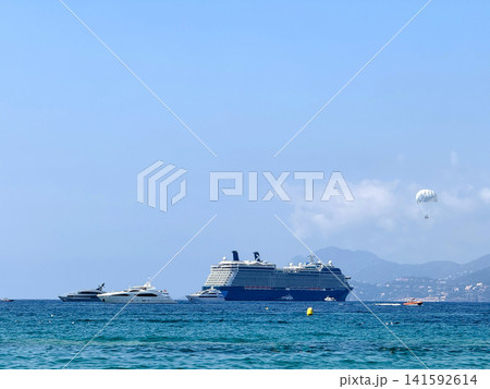 Luxury cruise ship sailing near Cannes coastline France Luxury cruise ship sailing near Cannes coastline France 141592614