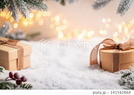 Rustic Gift Boxes on Snow with Frosted Pine and Warm Lights Rustic Gift Boxes on Snow with Frosted Pine and Warm Lights 141592668