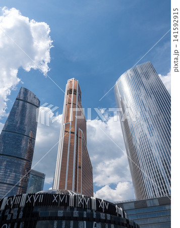 Modern high-rise buildings in Moscow city business district against the sky, urban architecture and contemporary cityscape Modern high-rise buildings in Moscow city business district against the sky, urban architecture and contemporary cityscape 141592915