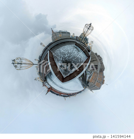 Russia Moscow 07 February 2026: Winter 360 panorama of Moscow Kremlin and Red Square transformed into a tiny planet effect. View from a bridge with snow covering iconic Russian architecture 141594144