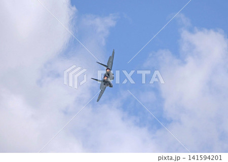 Russia Kubinka 12 April 2025. MiG-35 fighter jet performing aerobatics during an air show. Russian 4 plus plus generation multirole aircraft in flight with smoke trails Russia Kubinka 12 April 2025. MiG-35 fighter jet performing aerobatics during an air show. Russian 4 plus plus generation multirole aircraft in flight with smoke trails 141594201