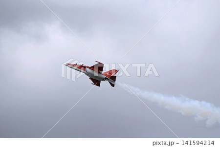 Russia Kubinka 12 April 2025. Yak-130 trainer aircraft performing aerobatics during an air show. Russian combat trainer in flight with smoke trails against blue sky Russia Kubinka 12 April 2025. Yak-130 trainer aircraft performing aerobatics during an air show. Russian combat trainer in flight with smoke trails against blue sky 141594214