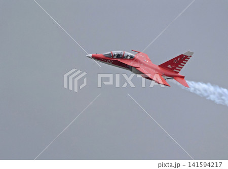 Russia Kubinka 12 April 2025. Yak-130 trainer aircraft performing aerobatics during an air show. Russian combat trainer in flight with smoke trails against blue sky Russia Kubinka 12 April 2025. Yak-130 trainer aircraft performing aerobatics during an air show. Russian combat trainer in flight with smoke trails against blue sky 141594217