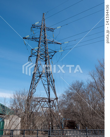 High voltage power lines against sky electrical transmission towers energy infrastructure industrial landscape. High voltage power lines against sky electrical transmission towers energy infrastructure industrial landscape. 141594436