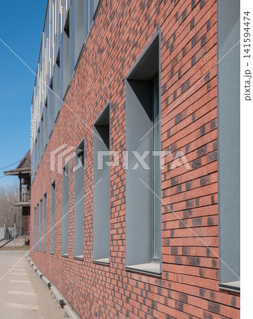 Building facade with windows architectural exterior background urban structure. Building facade with windows architectural exterior background urban structure. 141594474