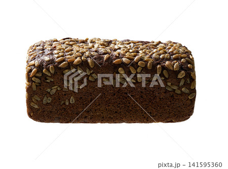 loaf of freshly baked wholemeal rye bread with sunflower seeds , isolated on white background. loaf of freshly baked wholemeal rye bread with sunflower seeds , isolated on white background. 141595360