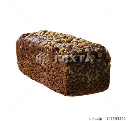 loaf of freshly baked wholemeal rye bread with sunflower seeds , isolated on white background. 141595361
