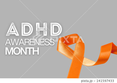 Bright orange ribbon signifies ADHD awareness and support efforts 141597433
