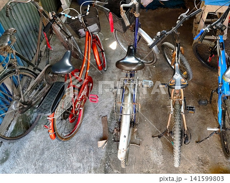 several bicycles are parked neatly several bicycles are parked neatly 141599803