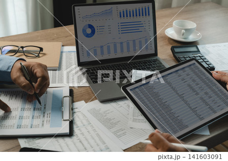 business discuss Investment Consultant, Financial advisor and accounting financial spreadsheets on tablet and laptop, reports support accounting review, report analysis document workflow. business discuss Investment Consultant, Financial advisor and accounting financial spreadsheets on tablet and laptop, reports support accounting review, report analysis document workflow. 141603091