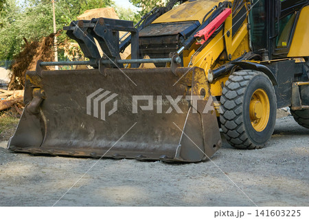 Load bucket of construction bulldozer for work 141603225