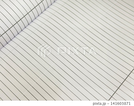Close-up of open blank lined notebook pages, abstract curved paper pattern. Minimal stationery background with copy space for writing, education, notes, back to school designs Close-up of open blank lined notebook pages, abstract curved paper pattern. Minimal stationery background with copy space for writing, education, notes, back to school designs 141603871
