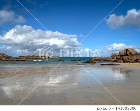 Granite reefs and shallow water along Tregastel Brittany France beach Granite reefs and shallow water along Tregastel Brittany France beach 141605800