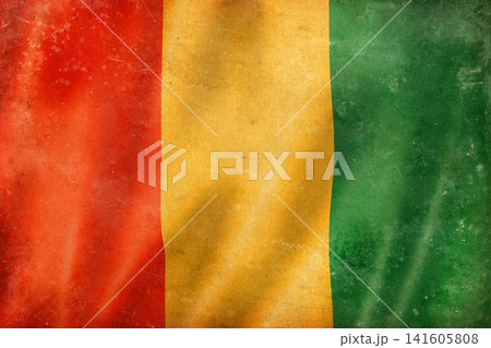 Old vintage flag of Guinea, worn and stained 141605808