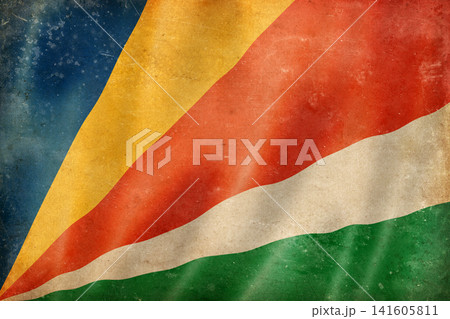 Old vintage flag of Seychelles, worn and stained Old vintage flag of Seychelles, worn and stained 141605811