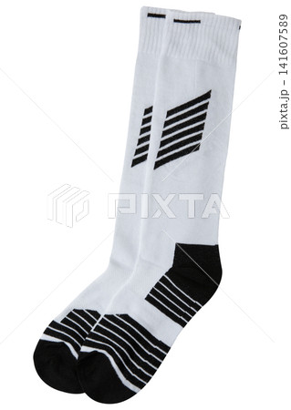 Pair of white high athletic socks with black stripes isolated on white background. Long sports crew socks for football, running, and training 141607589