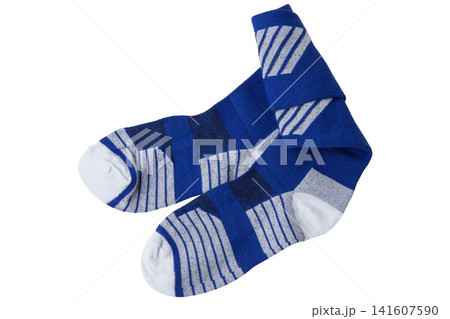 Folded blue athletic socks isolated on white background. Pair of padded sport knee socks for skiing, football, and hiking. Folded blue athletic socks isolated on white background. Pair of padded sport knee socks for skiing, football, and hiking. 141607590
