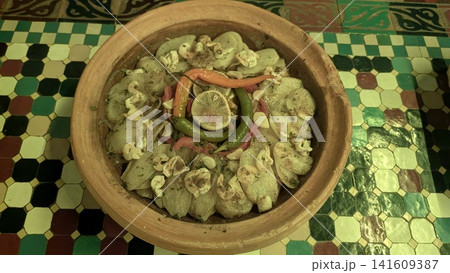 Traditional Moroccan Seafood Tagine with Shrimps and Lemon in Clay Pot 141609387