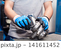 Manual work in the automotive industry 141611452