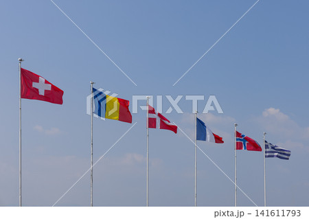 Six flags of Switzerland, Romania, Denmark, France, Norway and Greece receding in line Six flags of Switzerland, Romania, Denmark, France, Norway and Greece receding in line 141611793